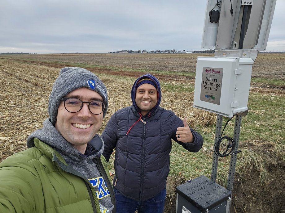 McMaine and grad student with installed system