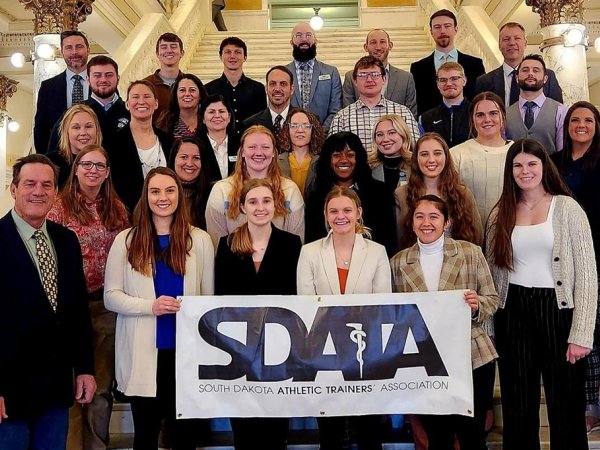 South Dakota athletic trainers gather on the Capitol steps with Lt. Gov. Larry Rhoden during the South Dakota Athletic Trainers’ Association “Hit the Hill Day” in Pierre. 