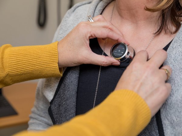 Nurse using a Stethoscope  