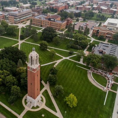 Aerial view of campus from the west during summer.