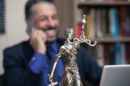 Legal Studies Professor with Sculpture