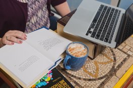 image of laptop, book and coffee