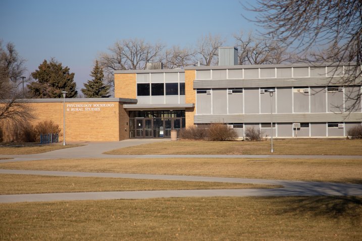 Exterior of the Psychology, Sociology, & Rural Studies building with the name on the building.