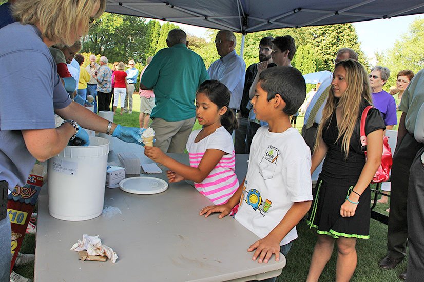 volunteers serving ice cream