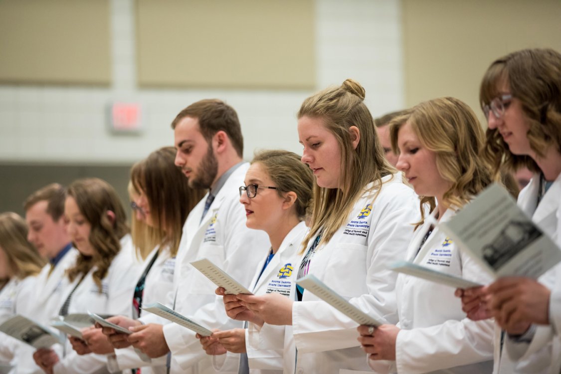 Pharmacy Students Receiving Their White Coats