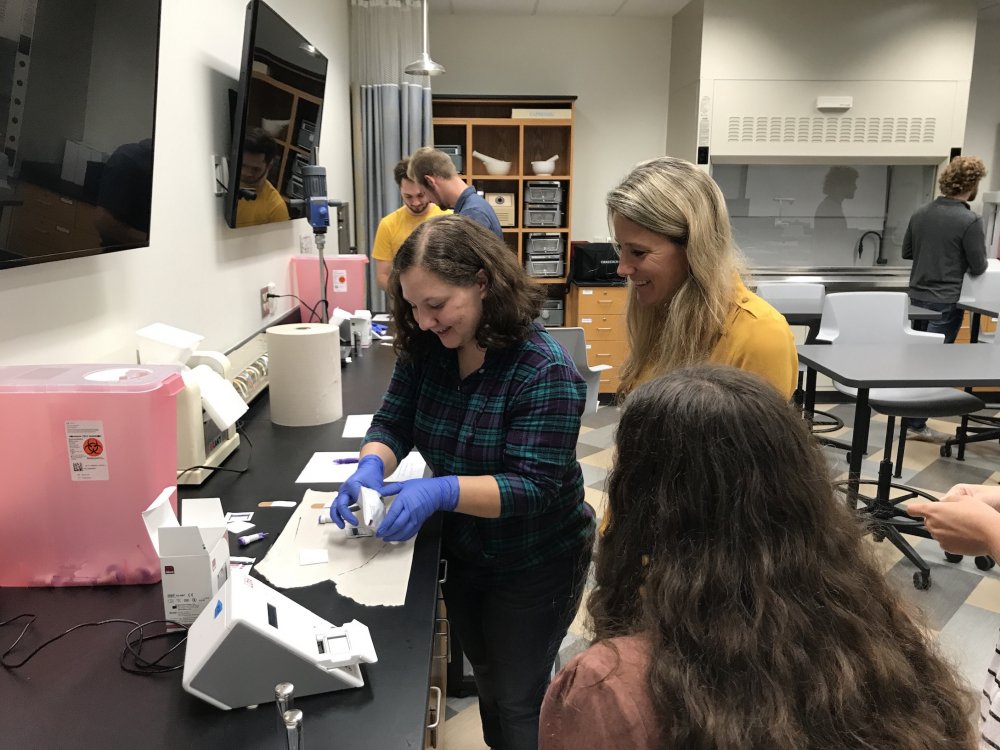 Students and faculty in lab