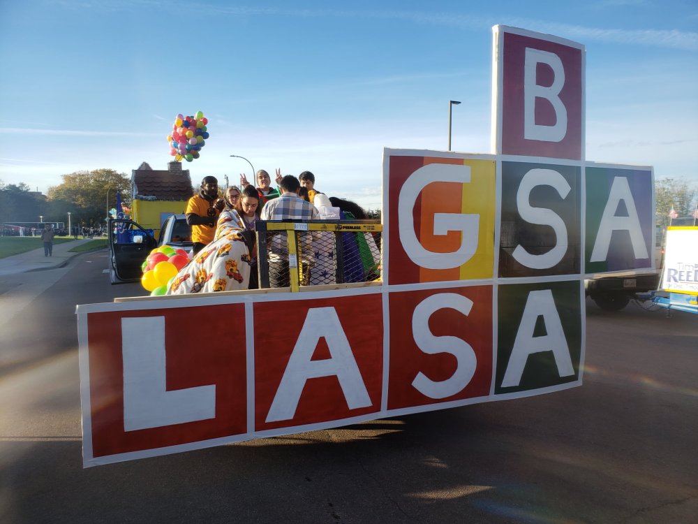 Student organization members on their Hobo Day parade float