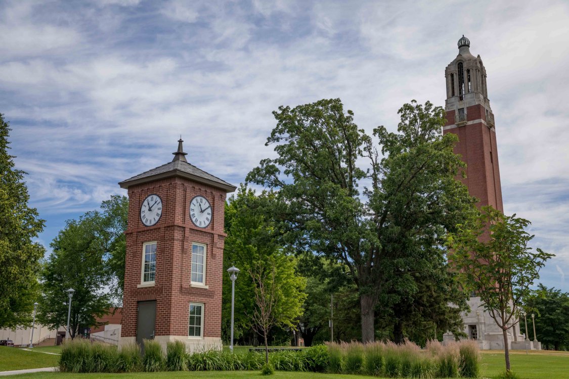 Campus image with campanile and watchtower.