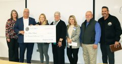 SDSU nursing student and South Dakota Air National Guard senior airman Ellise Otheim, third from left, is awarded a $5,000 Sanford Health Military and Veteran Scholarship in class Nov. 13.