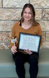 Abby Wortman with plaque