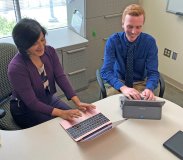 Student and faculty using computers