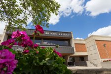 Briggs Library entrance with flowers