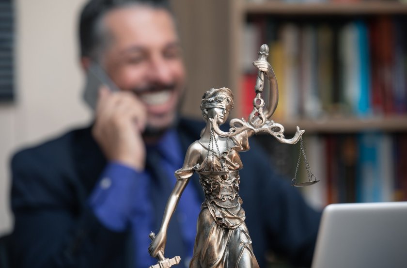 Legal Studies Professor with Sculpture