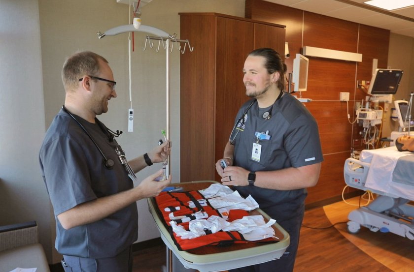 two SDSU respiratory care students in a hospital room