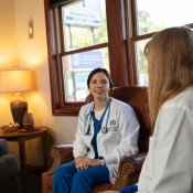 Two nursing students talking in the lobby at the Rapid City Nursing site.