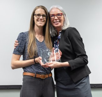 South Dakota Secretary of Health Melissa Magstadt, right, thanks Beth Walstrom, a Rapid City-based population health evaluation specialist, for the work she does at the Population Health Evaluation Center.