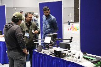 Students look at various drone options during “Drone Day” at South Dakota State University.